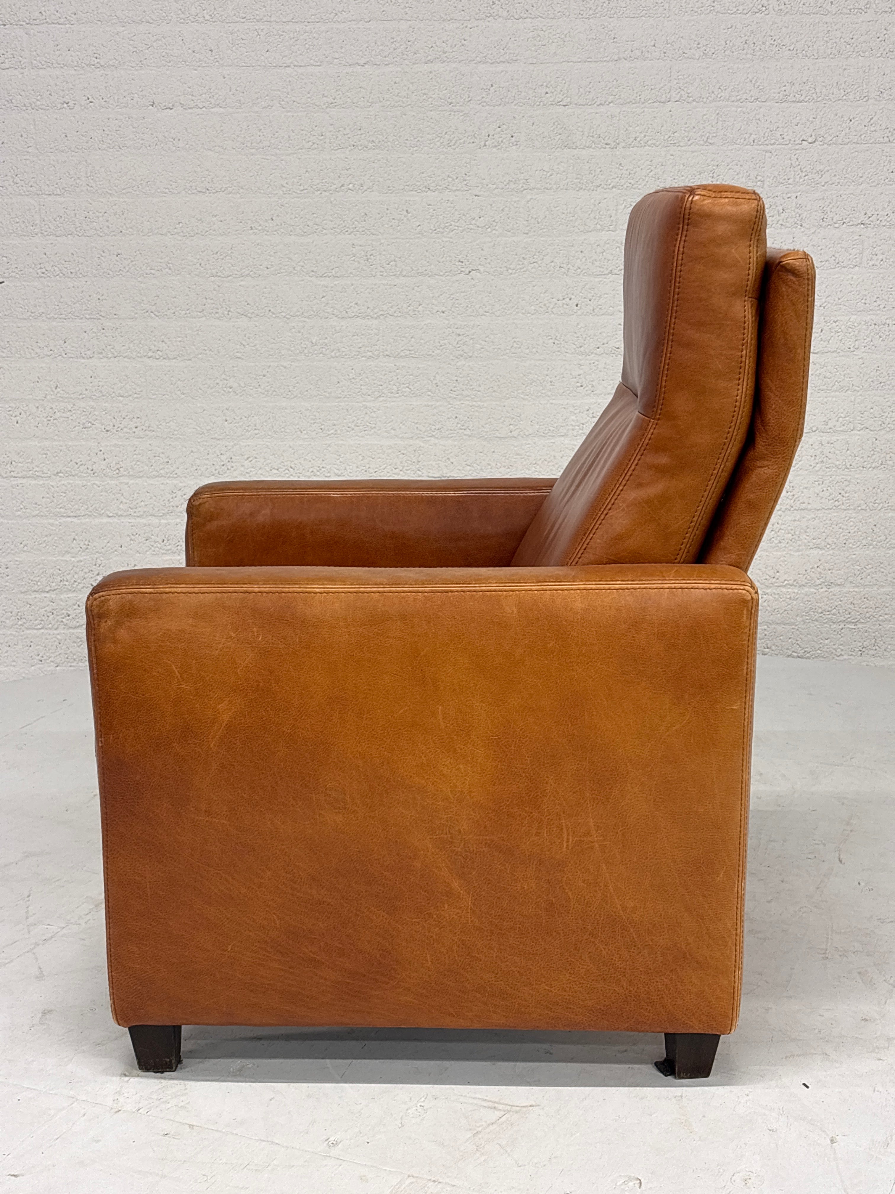 Leren fauteuil vaste rugleuning
