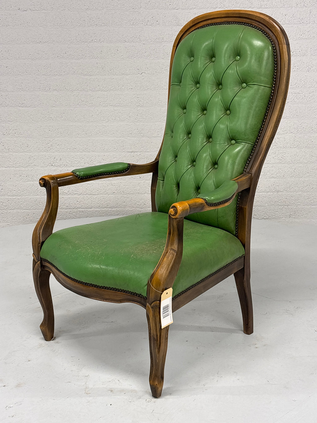 Fauteuil gecapitonneerd met lederlook