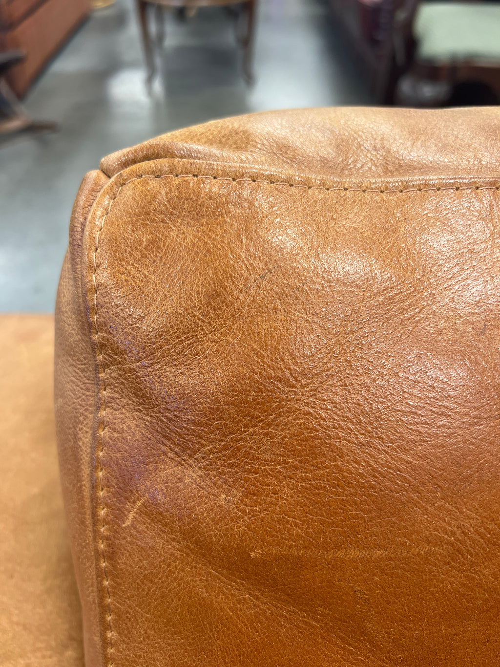 Cognac leren fauteuil met mooi patina