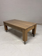 Eiken salontafel op wielen met lade