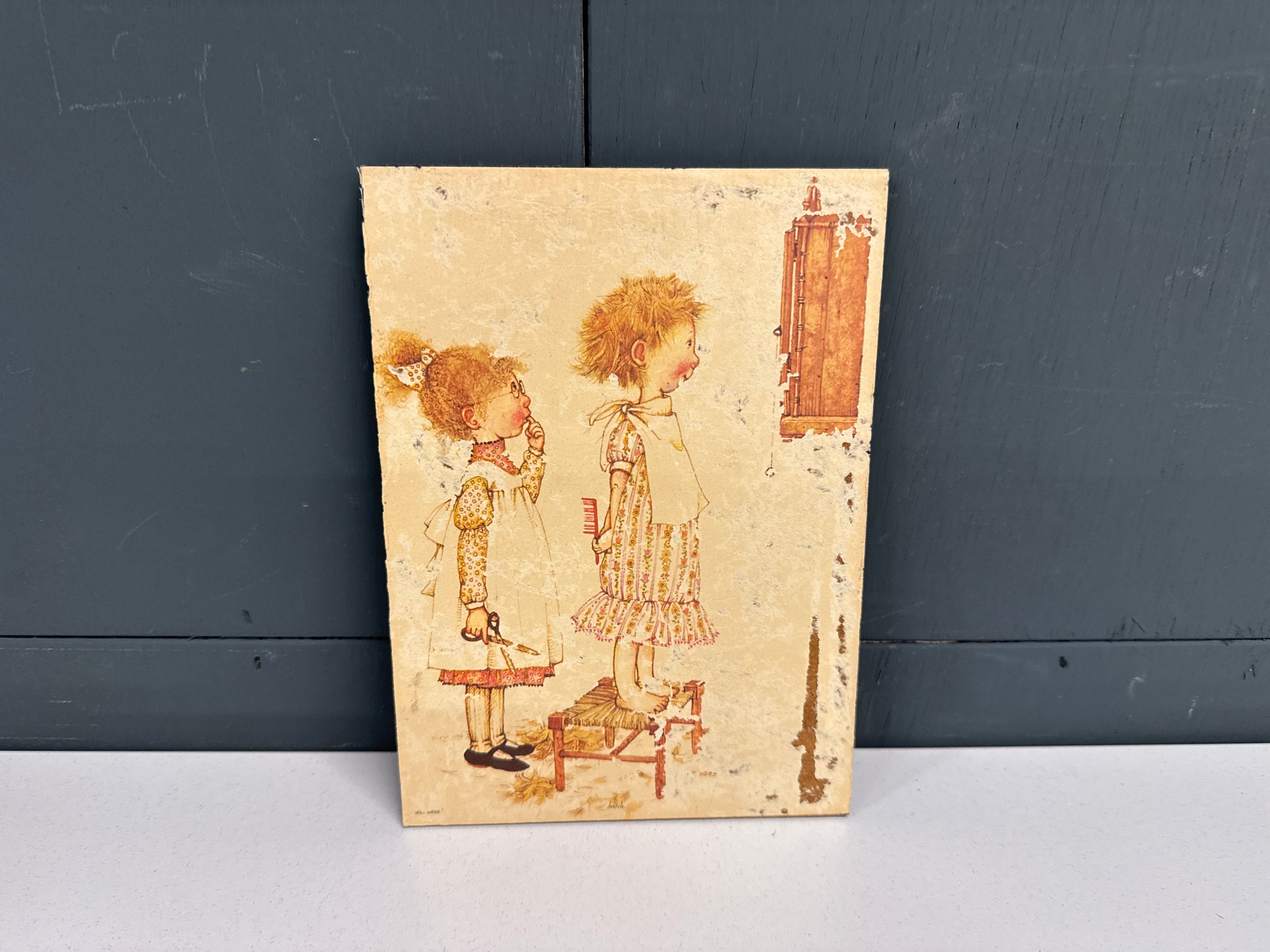 Prent klederdracht meisjes kapper