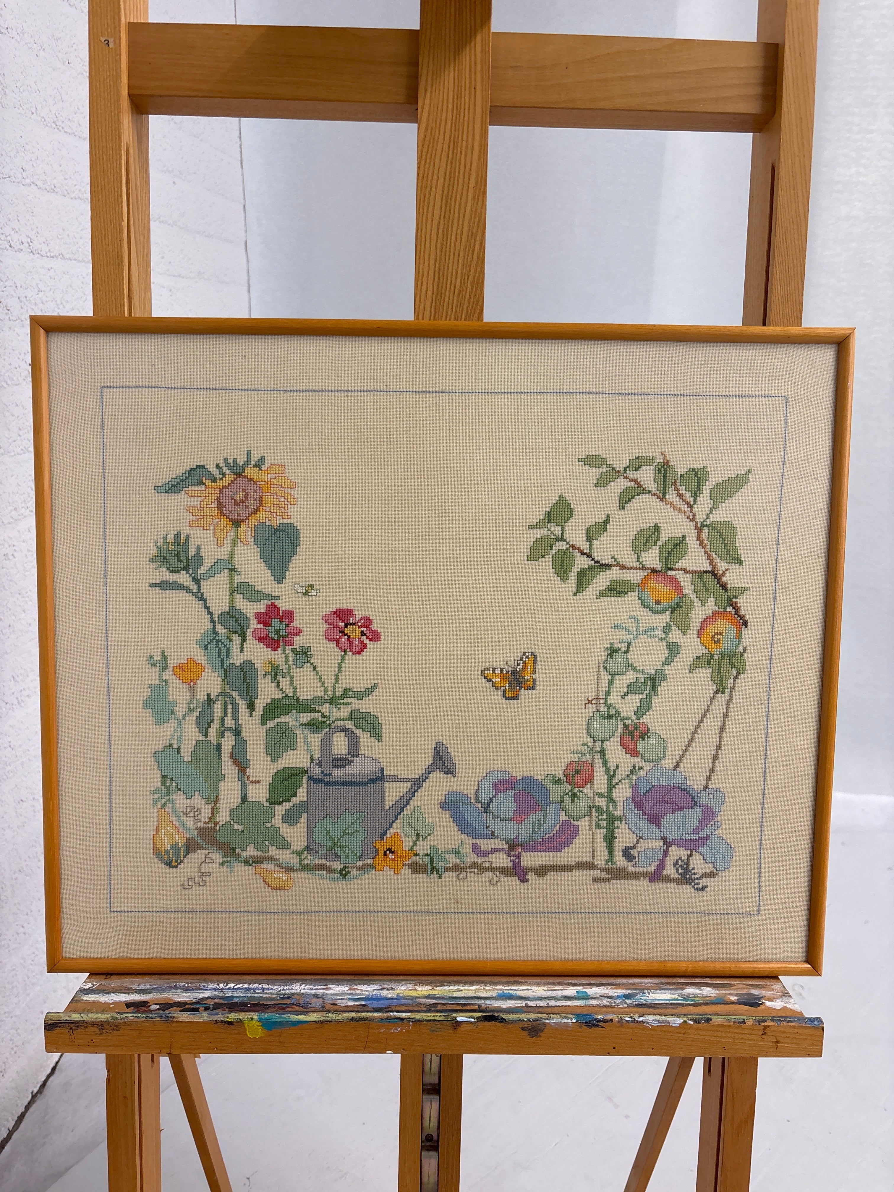 Tuiniersprent geborduurd