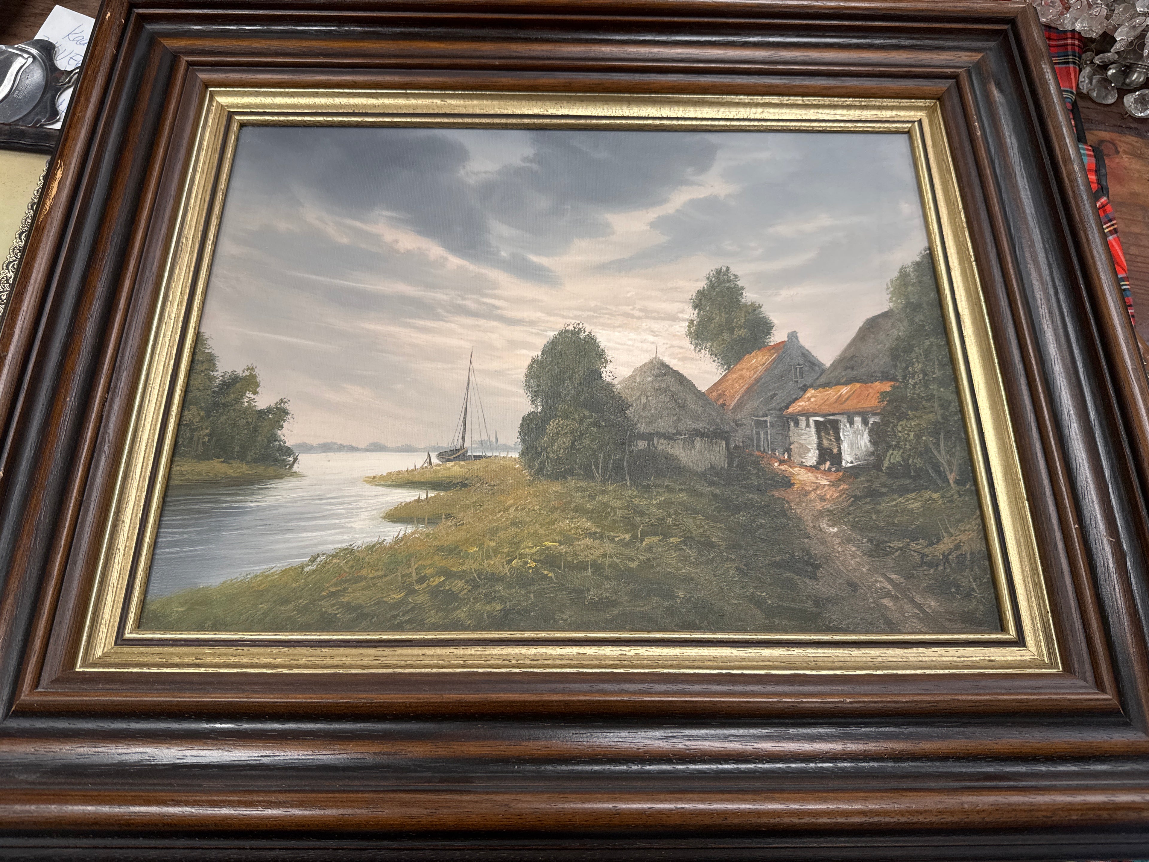 Schilderij landschap aan meer