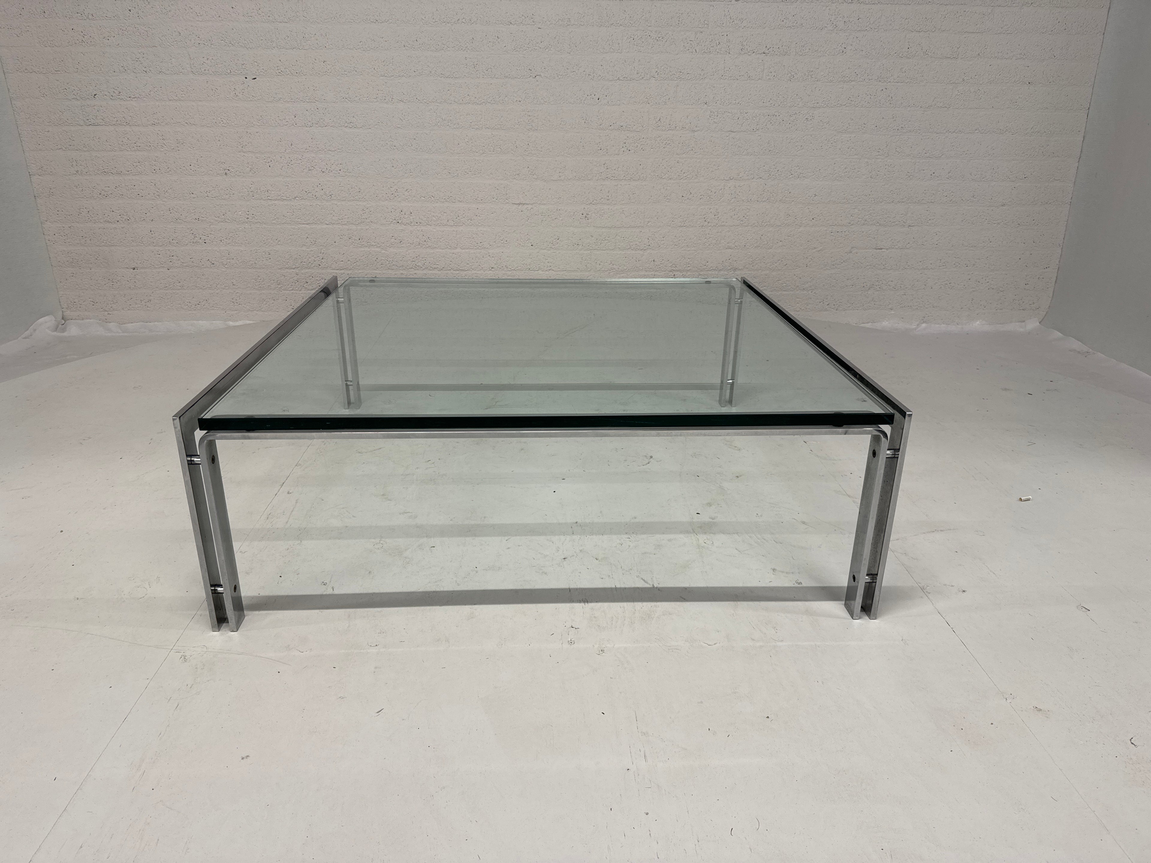 Design tafel Metaform NL RVS glas