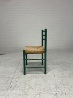 Groene vintage stoel met rotan zitting