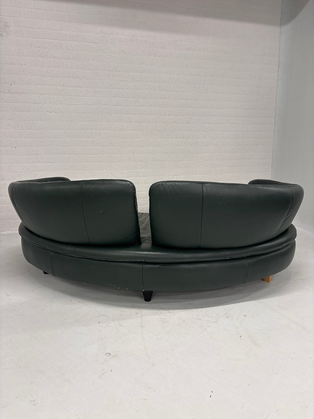 Half ronde bank leer