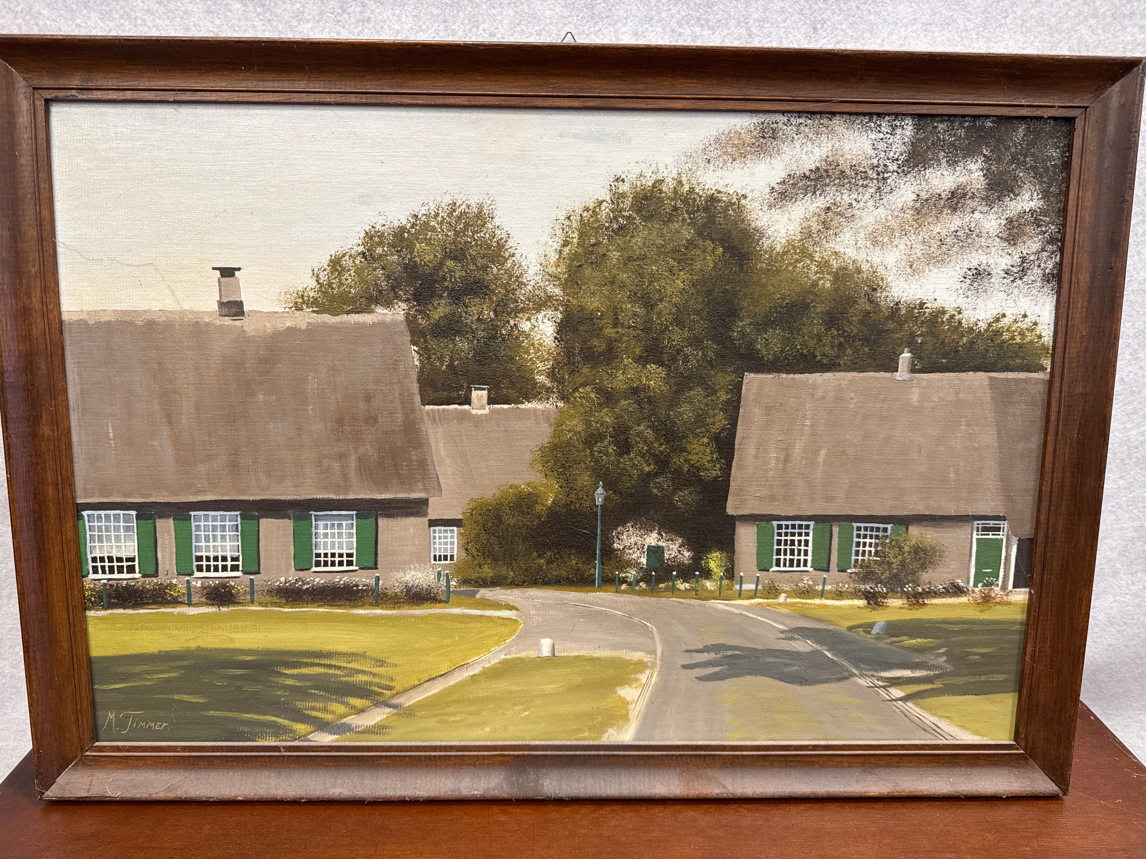 Schilderij boerderijen in straat