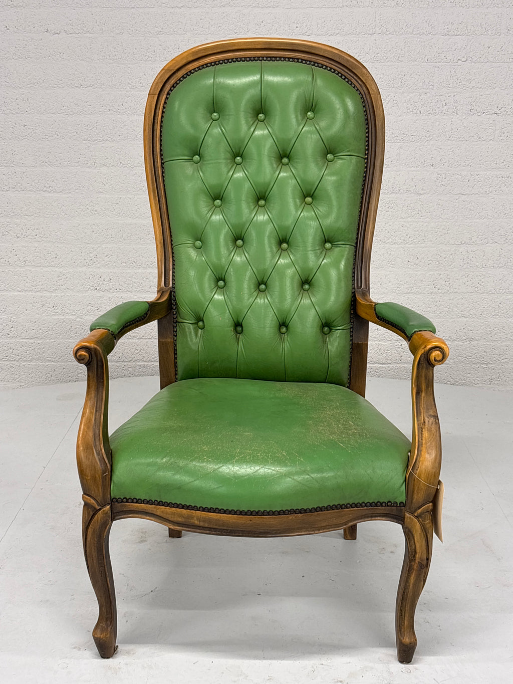Fauteuil gecapitonneerd met lederlook