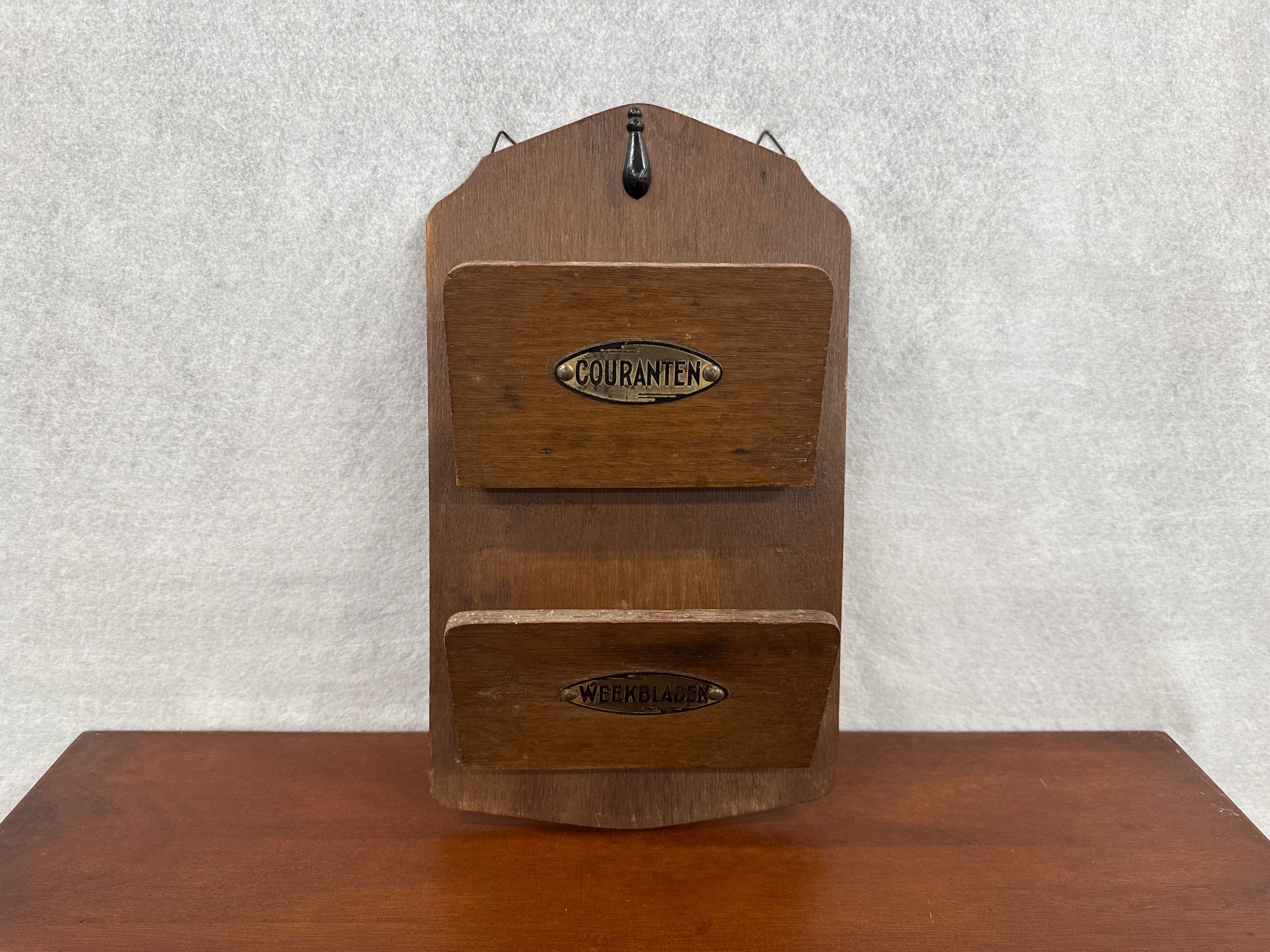 Courant en weekblad houder