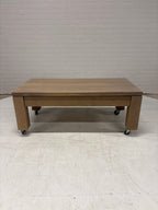 Eiken salontafel op wielen met lade