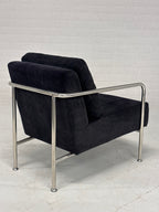 Design fauteuil zwarte stof met chromen frame