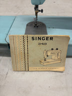 Singer 348 ijsblauwe naaimachine