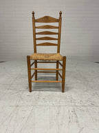 Vintage houten ladderstoel met rotan zitting