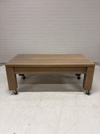 Eiken salontafel op wielen met lade