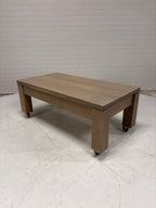 Eiken salontafel op wielen met lade