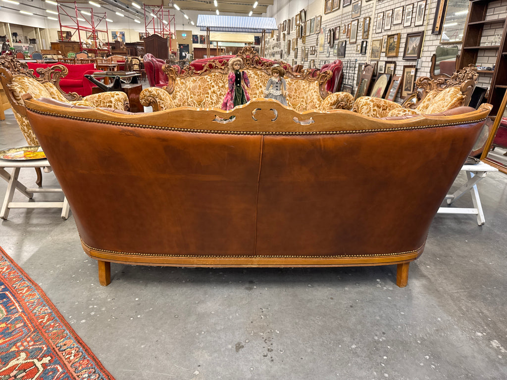 Bank leer en stof met zwanen