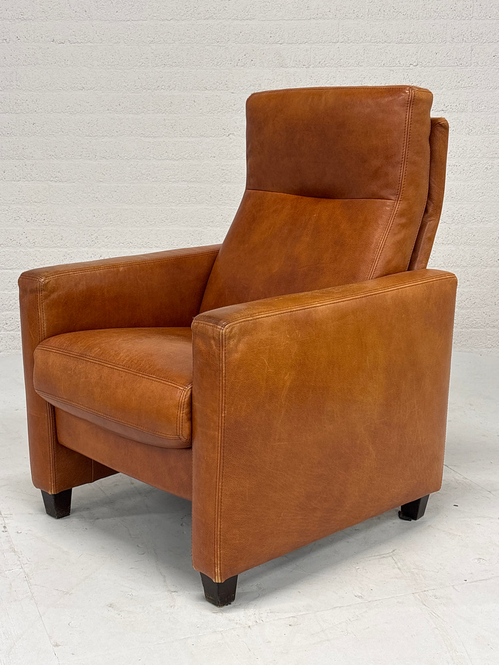 Leren fauteuil vaste rugleuning