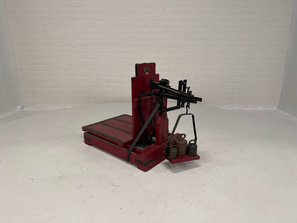 Bascule oud rood met gewichten