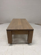 Eiken salontafel op wielen met lade