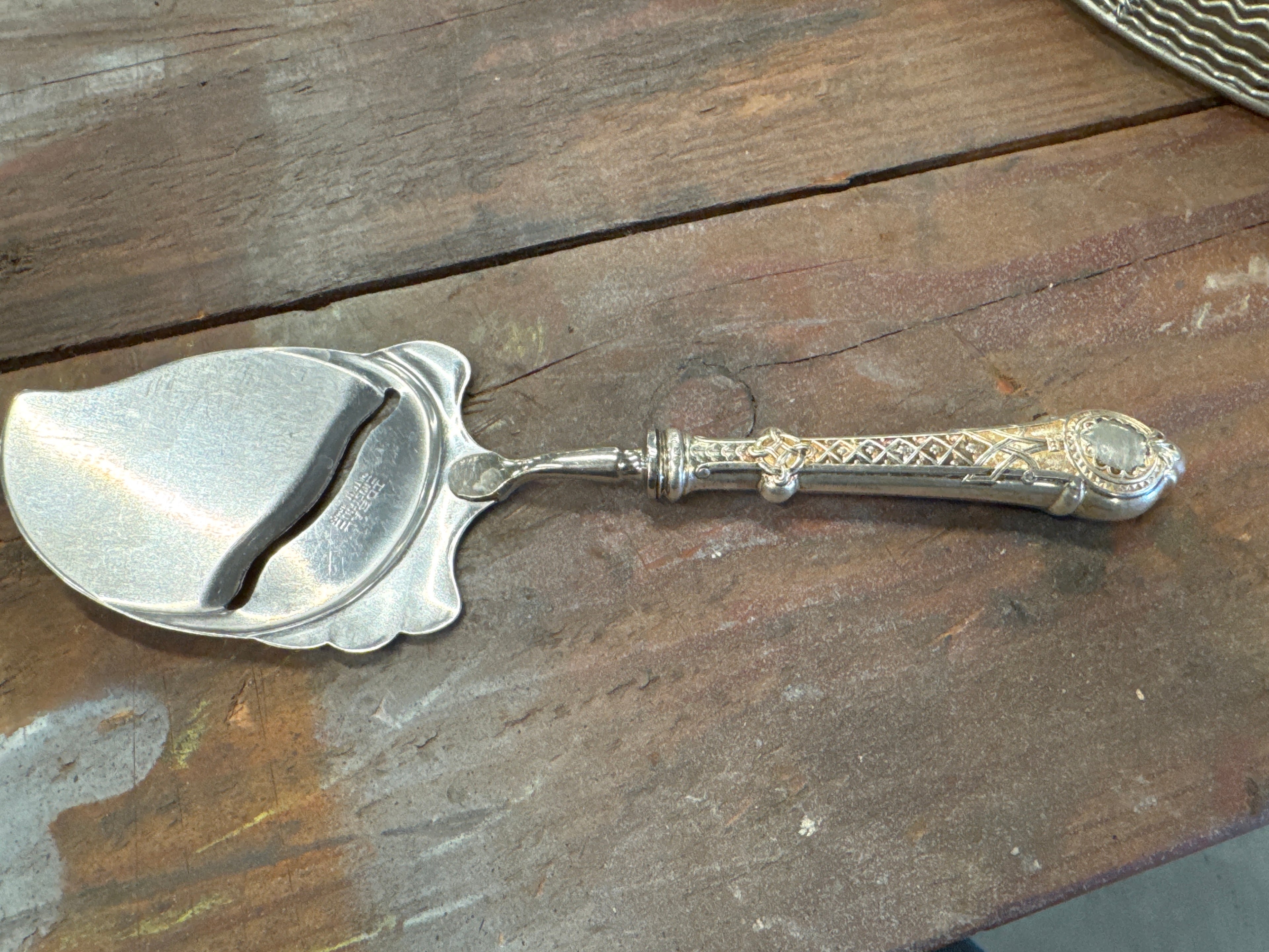 Kaasschaaf zilver handvat.830