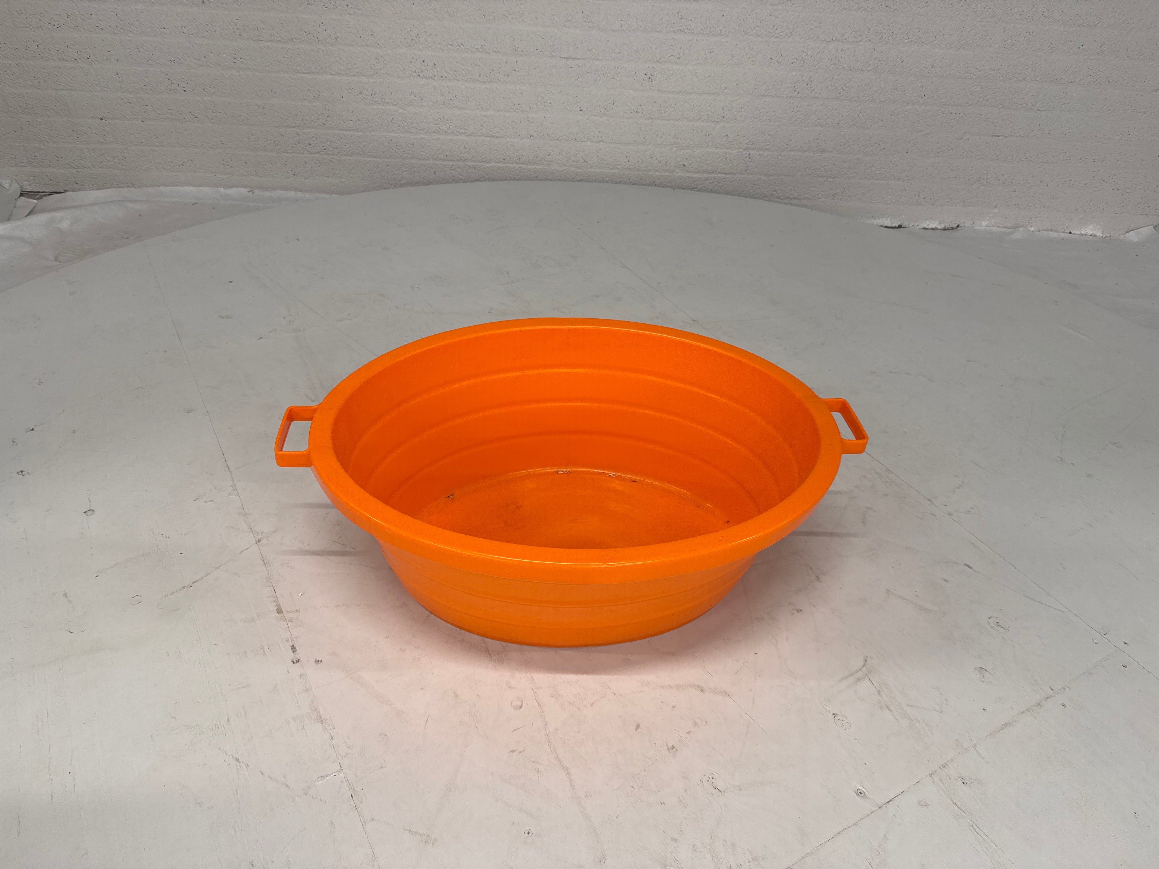 Wastobbe wasmand oranje