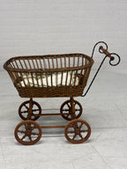 Antieke poppenwagen