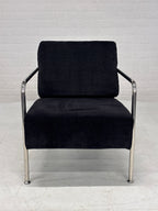Design fauteuil zwarte stof met chromen frame