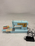 Singer 348 ijsblauwe naaimachine