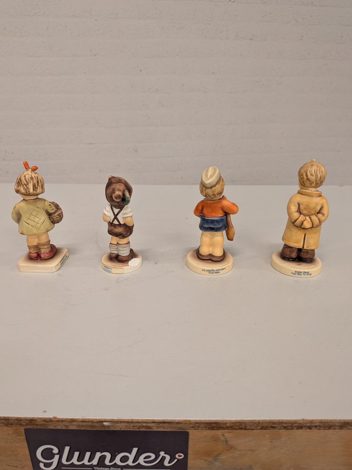 Set van 4 Goebel Hummel-beeldjes (beschadigd)