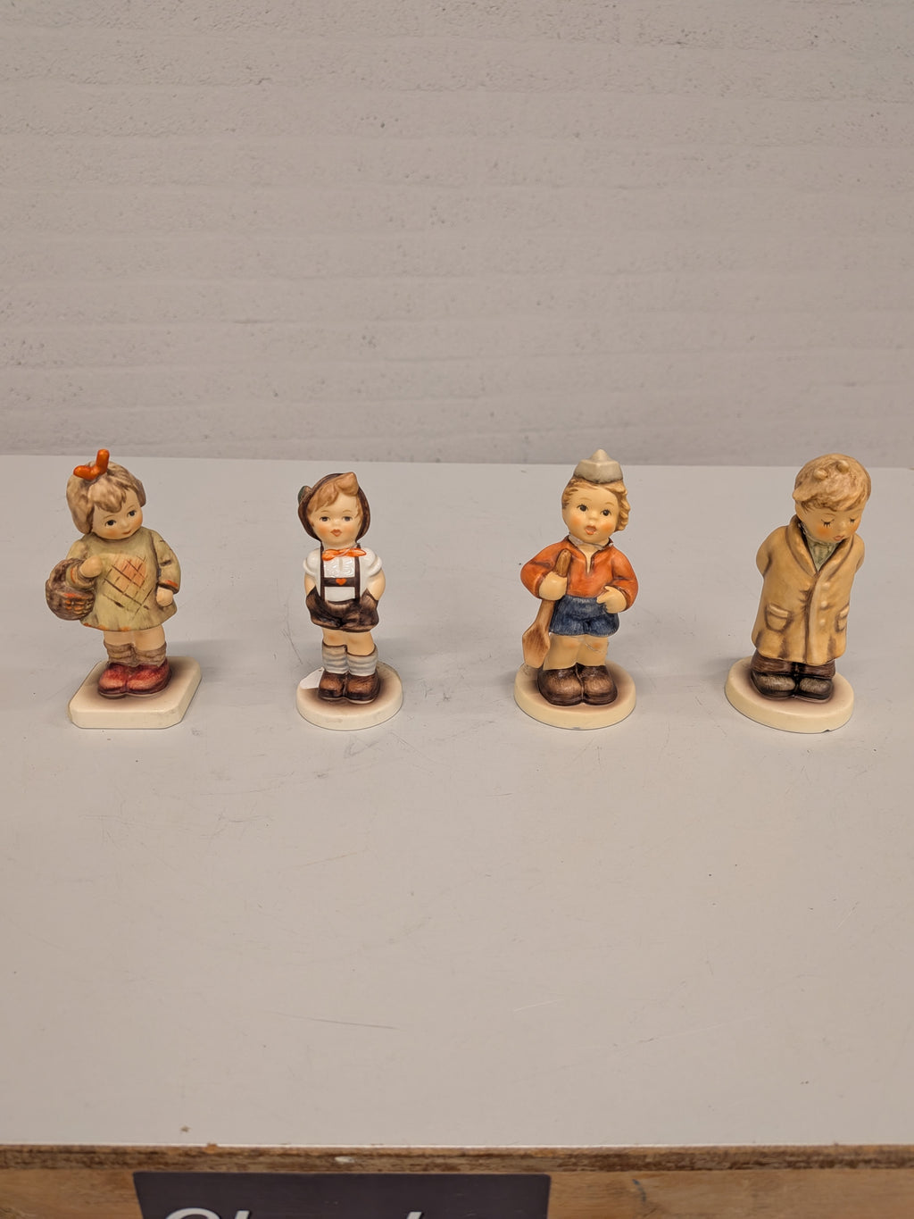 Set van 4 Goebel Hummel-beeldjes (beschadigd)
