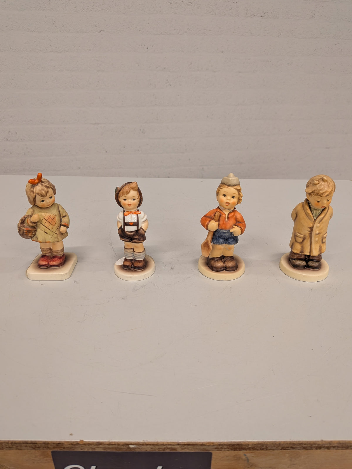 Set van 4 Goebel Hummel-beeldjes (beschadigd)