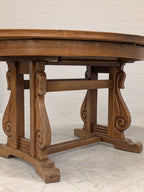 Ovale eiken eettafel met klapbladen