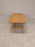 Vintage salontafel met lectuurrek