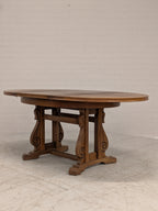 Ovale eiken eettafel met klapbladen