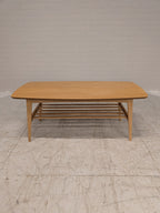 Vintage salontafel met lectuurrek