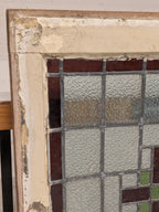 Glas-in-loodraam in houten kozijn