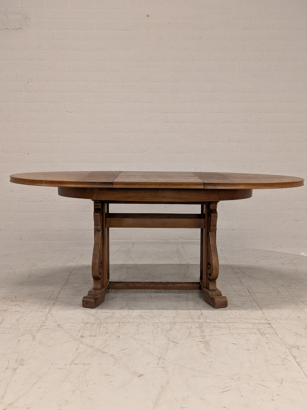Ovale eiken eettafel met klapbladen