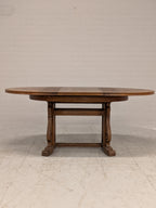 Ovale eiken eettafel met klapbladen