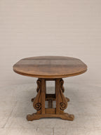 Ovale eiken eettafel met klapbladen