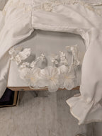 Vintage trouwjurk met sleep, sluier en hoofdtooi