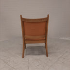 Vintage eiken fauteuil oranje bekleding