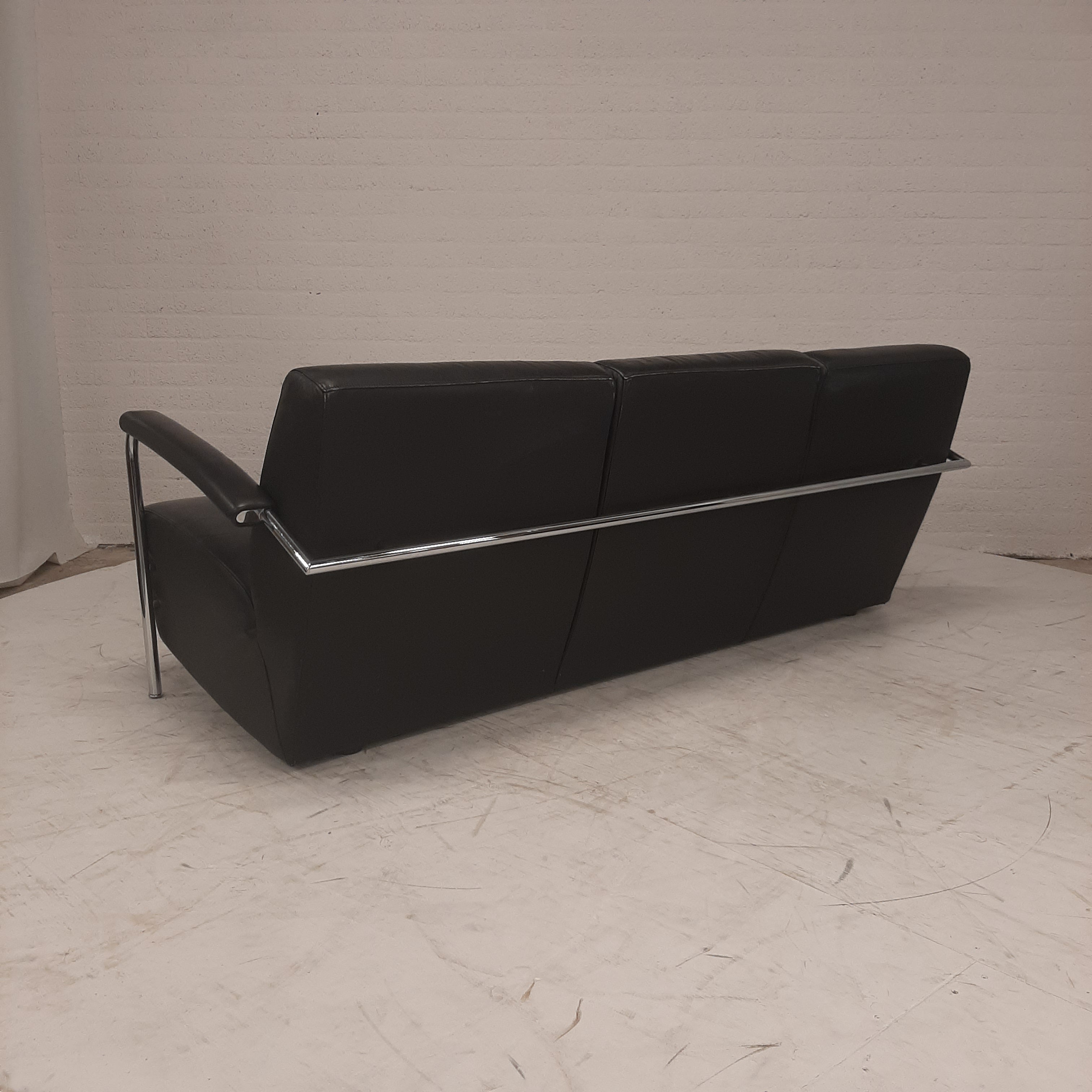 Leolux zwart leren bank rvs