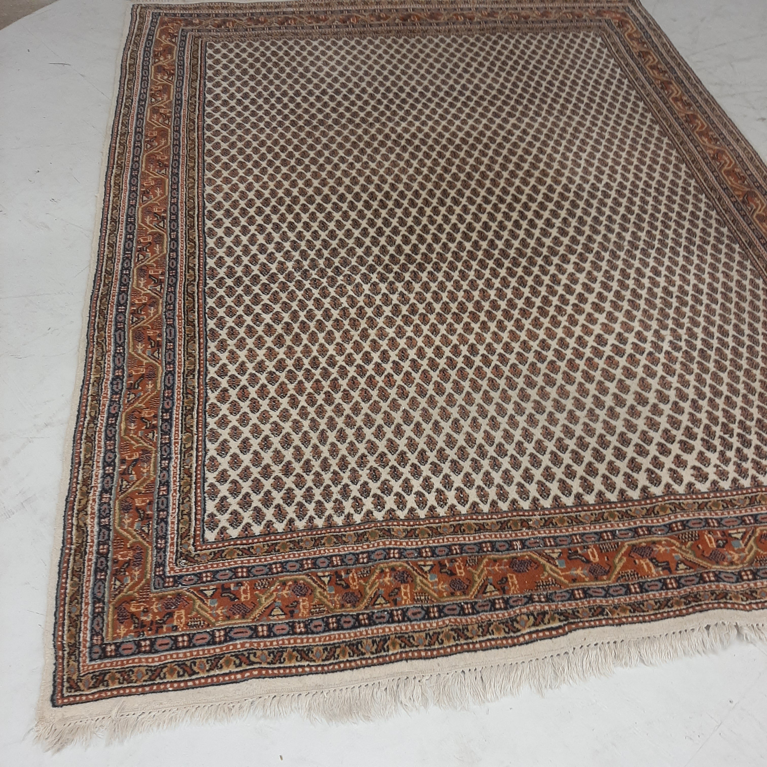 Perzisch tapijt in rood/beige tinten