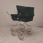 Vintage kinderwagen groen