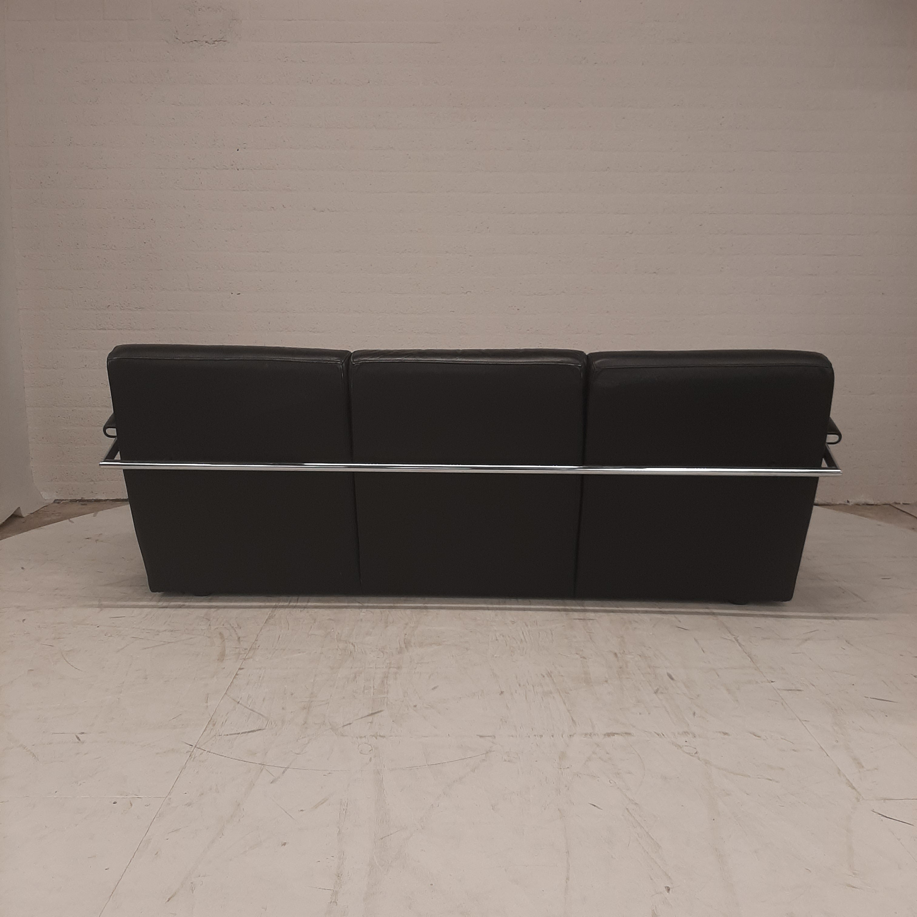 Leolux zwart leren bank rvs