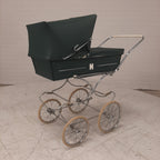 Vintage kinderwagen groen