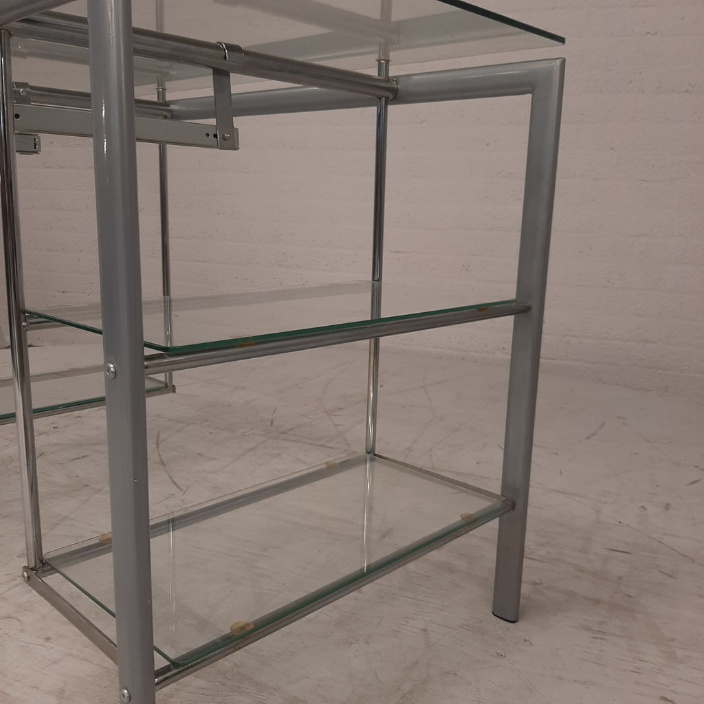 Glazen bureau op buizenframe