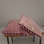 Set roze kussens met franjes
