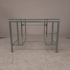 Glazen bureau op buizenframe