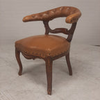 Antiek lederen fauteuil